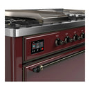 ILVE Majestic III 60-inch Dual Fuel Range with 7 Natural Gas Burner, Griddle, French Top and Solid Door Electric Oven in Burgundy with Burnished Trim (UM60FSQNR3BUB)