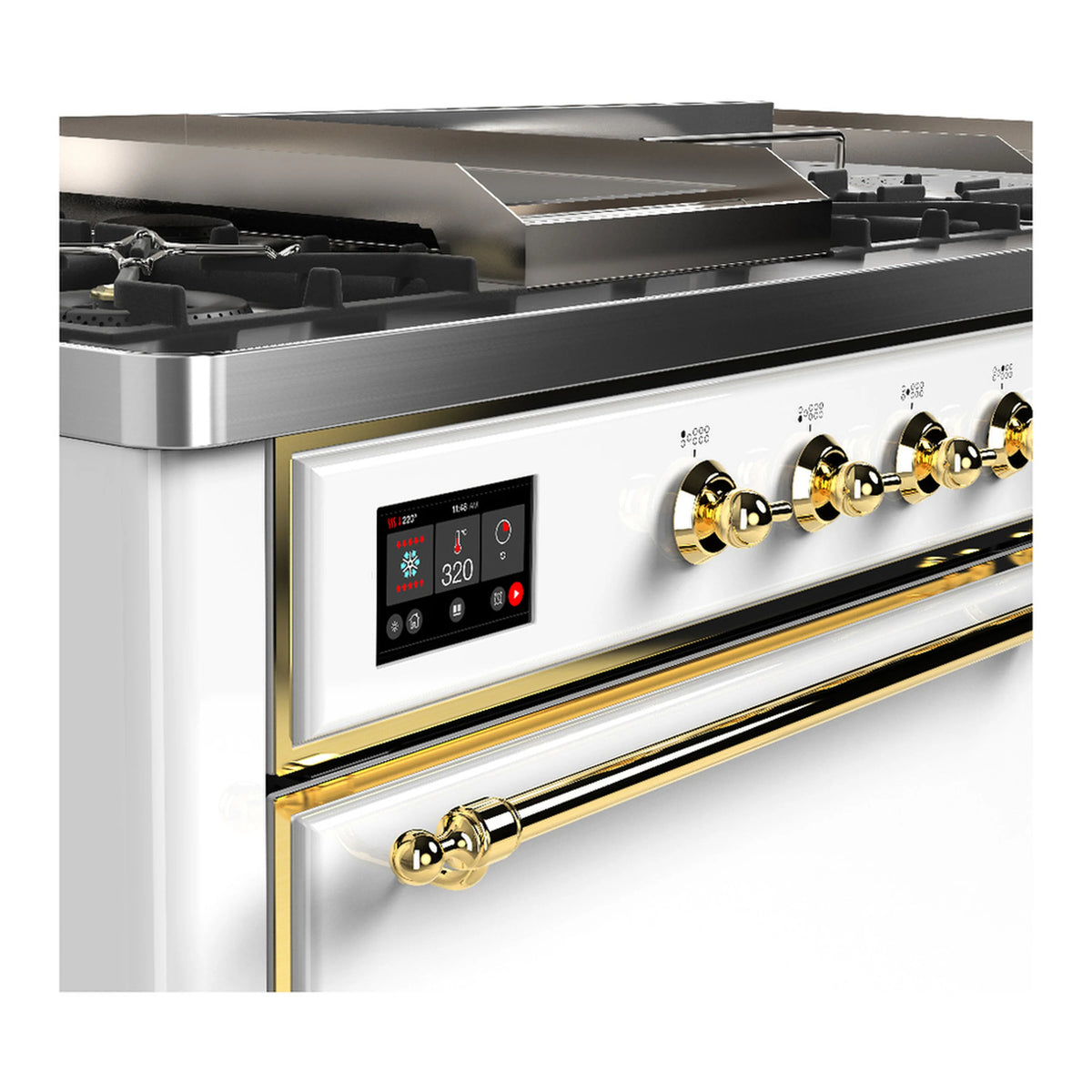 Close-up of white dual fuel range controls with brass knobs and display panel