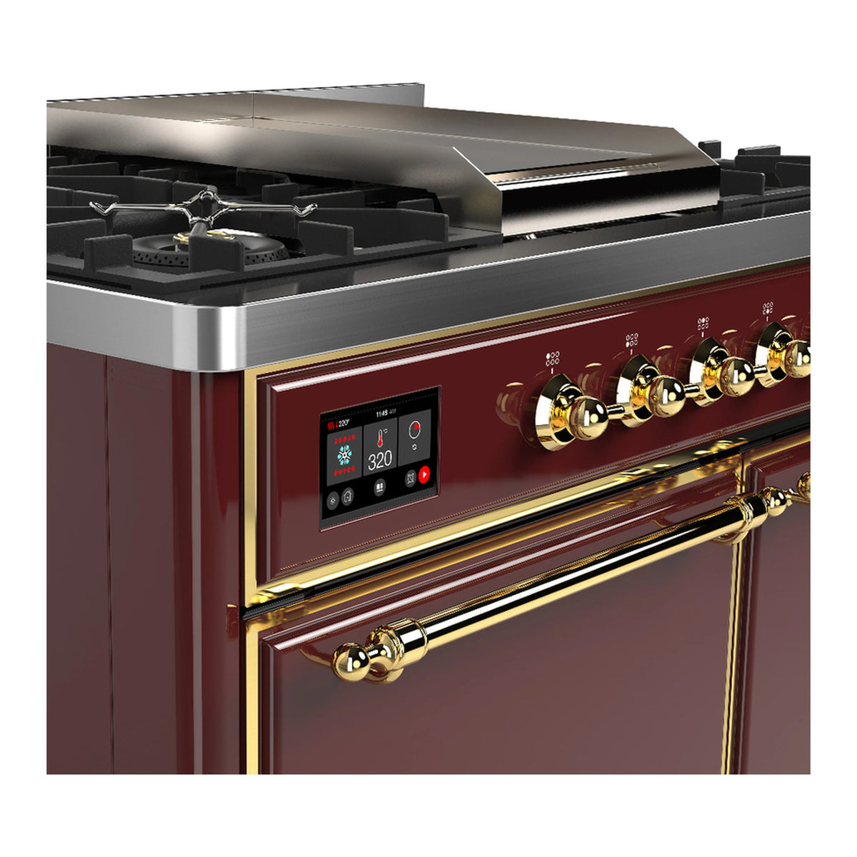 Burgundy dual fuel range control panel with brass knobs and dual brass oven handle bars