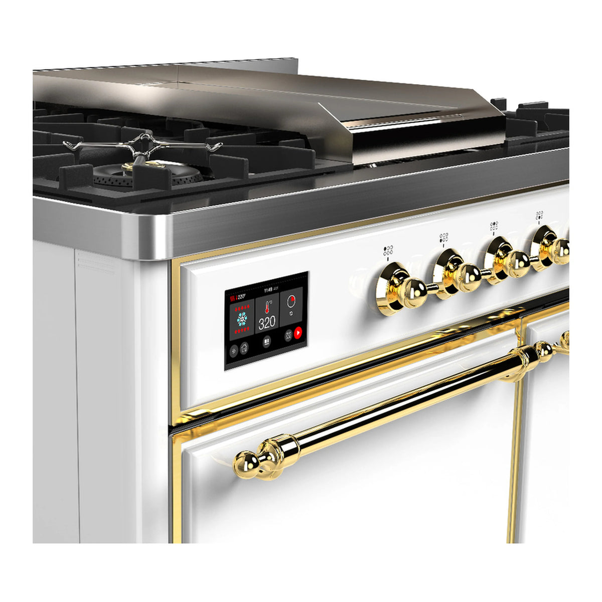 White dual fuel range close-up of brass control panel and burner knobs