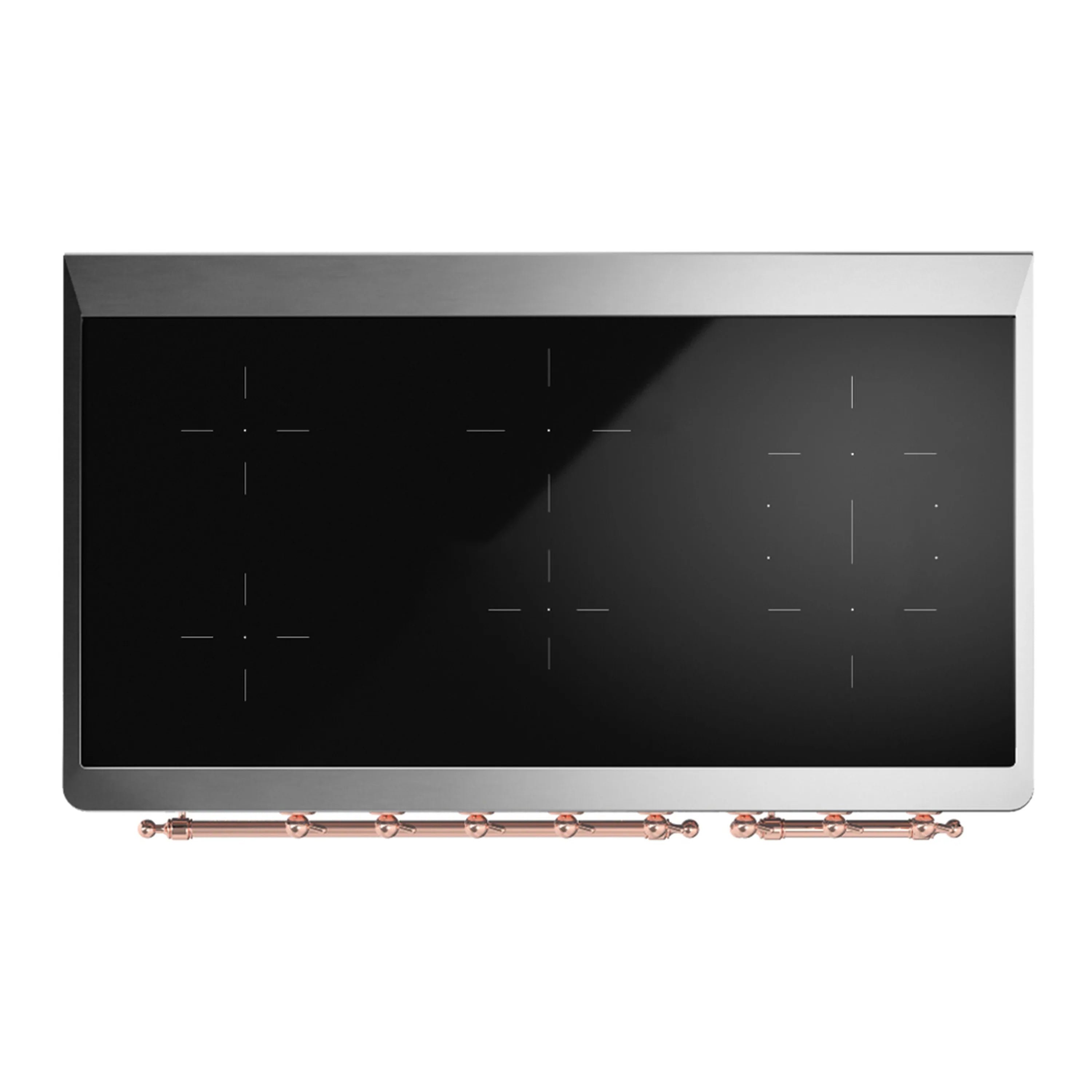 Black cooktop glass with burner zones and copper-finish trim on an induction range
