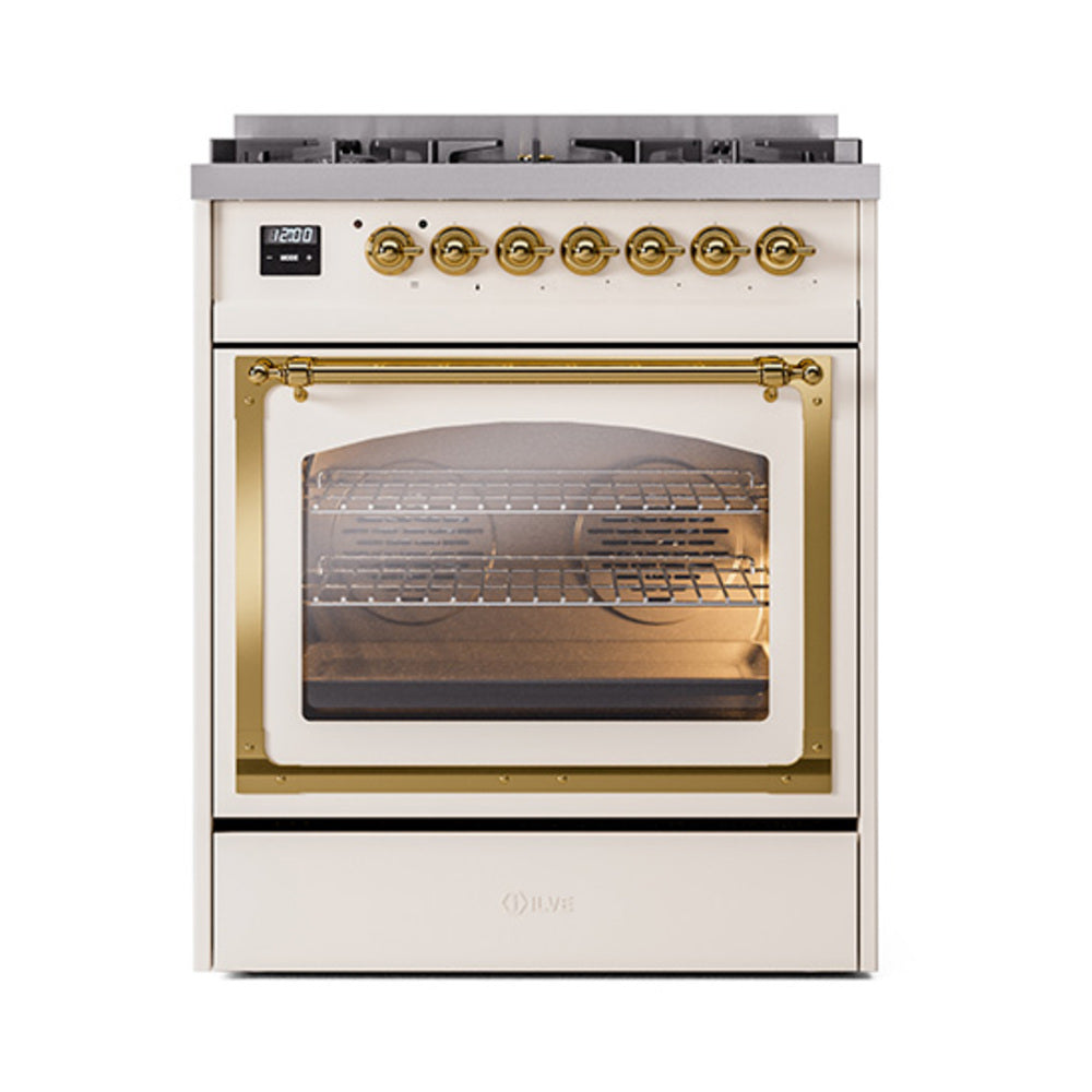 Antique white dual fuel range with brass controls and brass-trimmed triple glass oven door