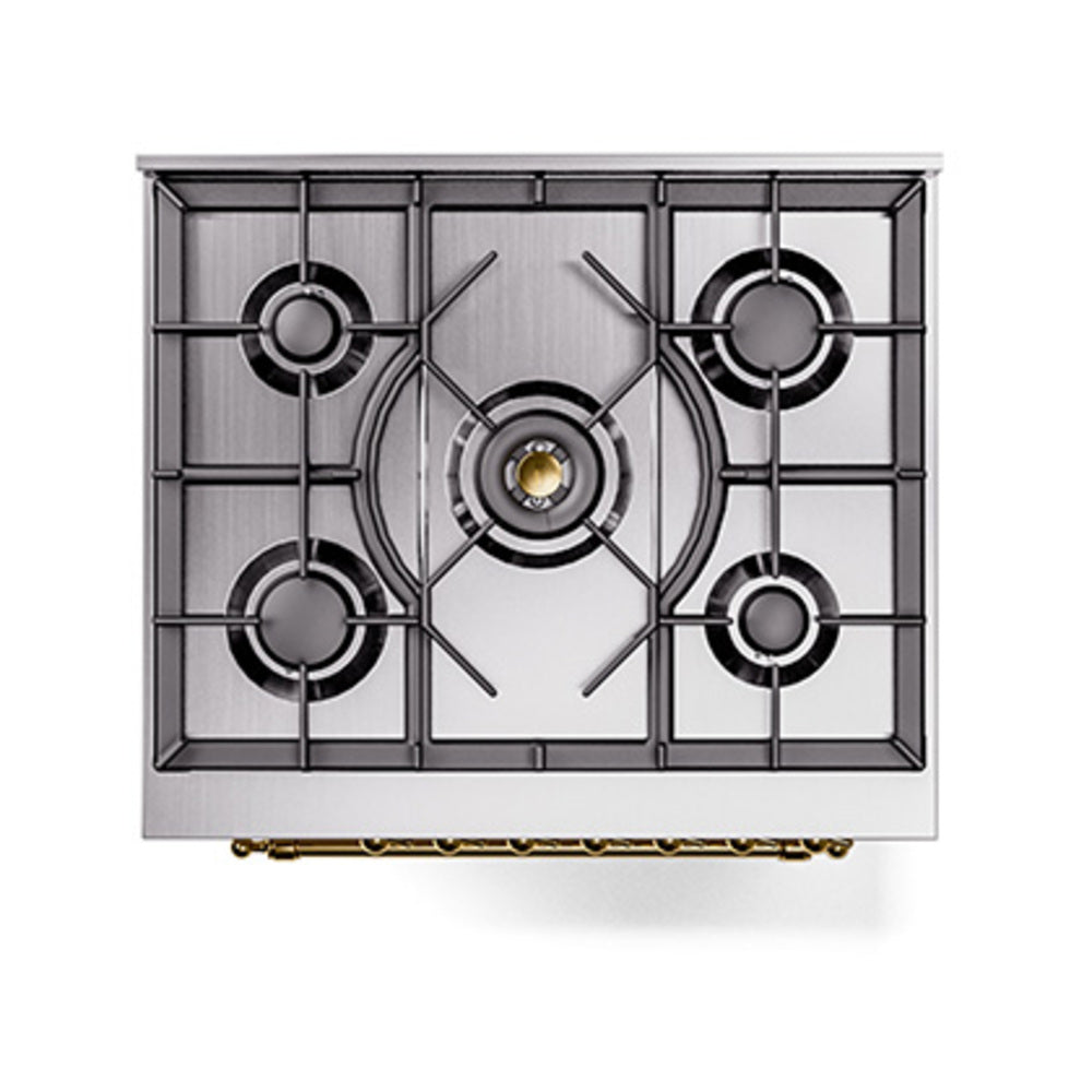 Brass-trimmed burner grate layout with four burners on antique white cooktop