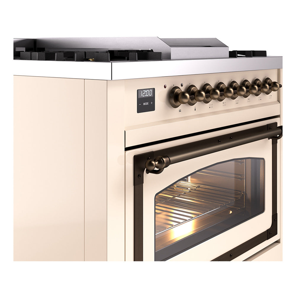 Antique white gas range side view with bronze knobs and glass oven door