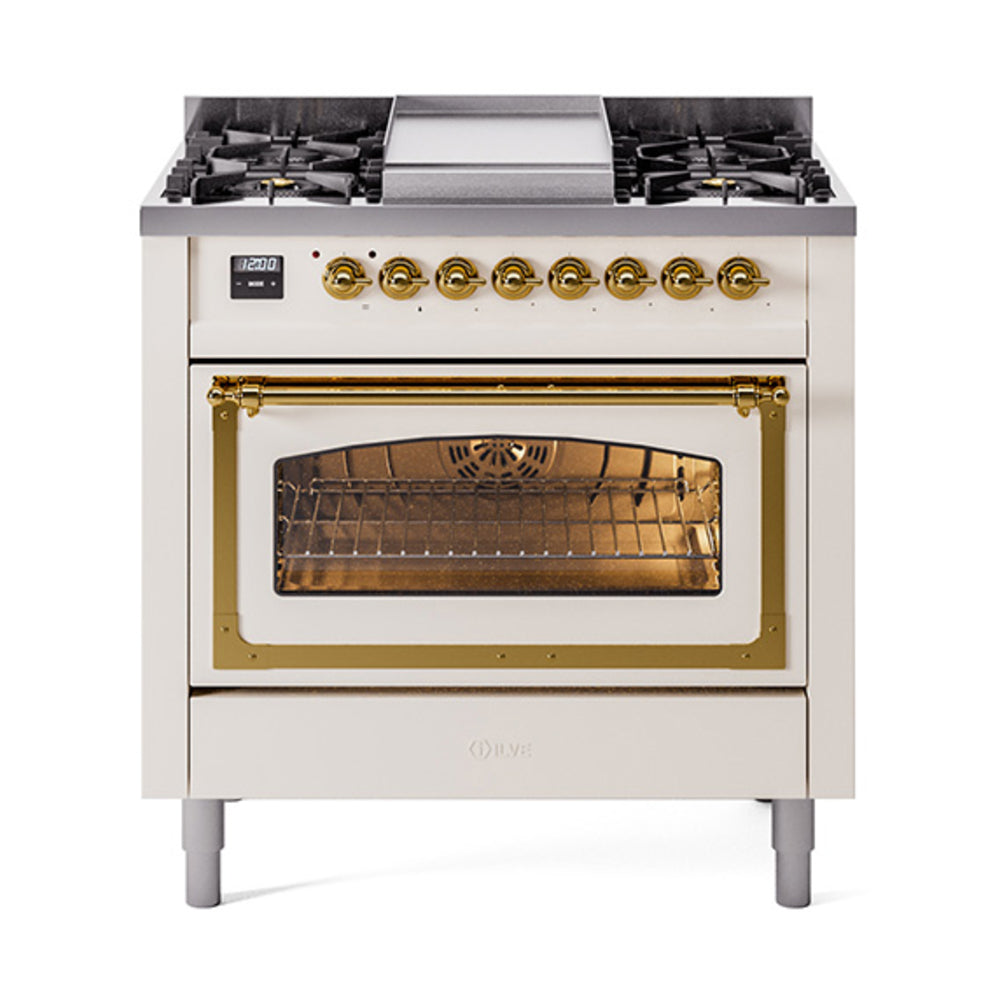Antique white dual fuel range with brass trim, front oven window, and top gas burners
