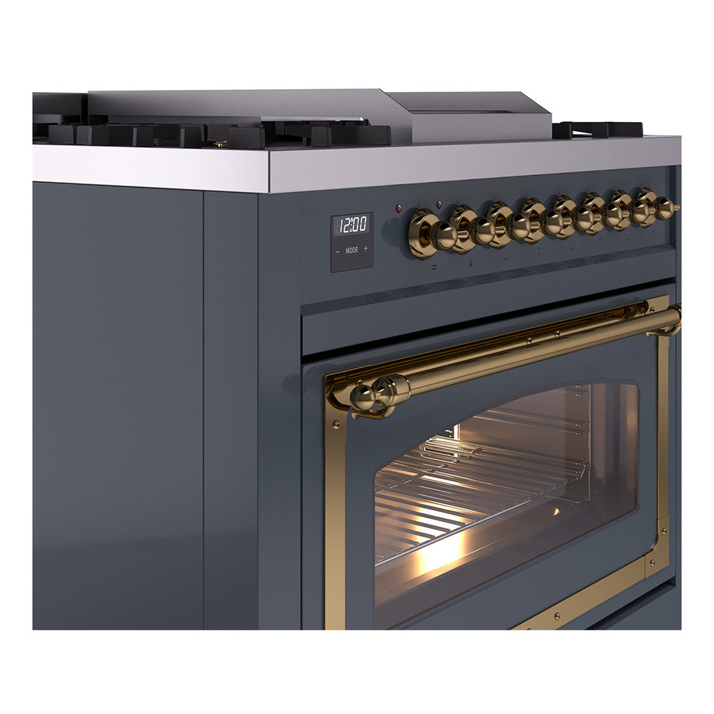 Blue-grey dual fuel gas range with brass handle and viewing-window oven door