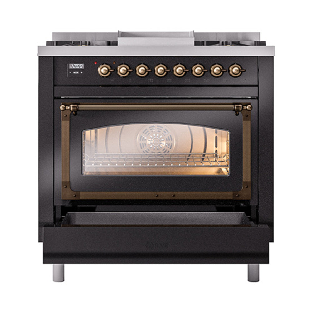 Glossy black dual-fuel gas range with triple-glass oven window and bronze control knobs