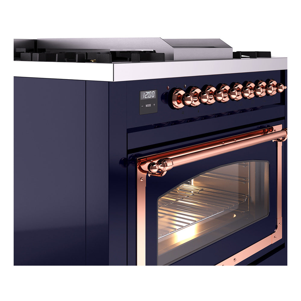 Midnight blue gas range corner view with copper control knobs and copper-framed glass oven door