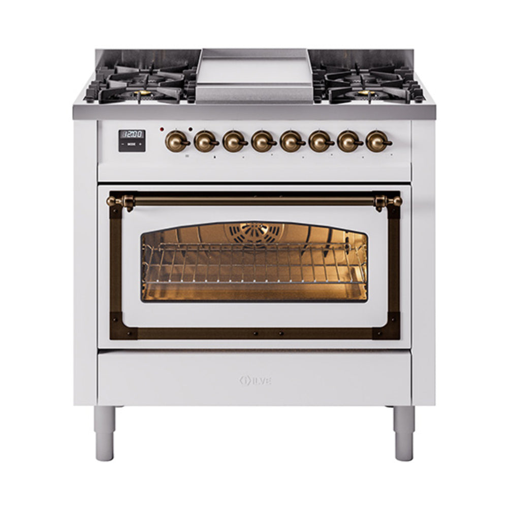 White dual fuel gas range with bronze knobs and triple-pane oven window