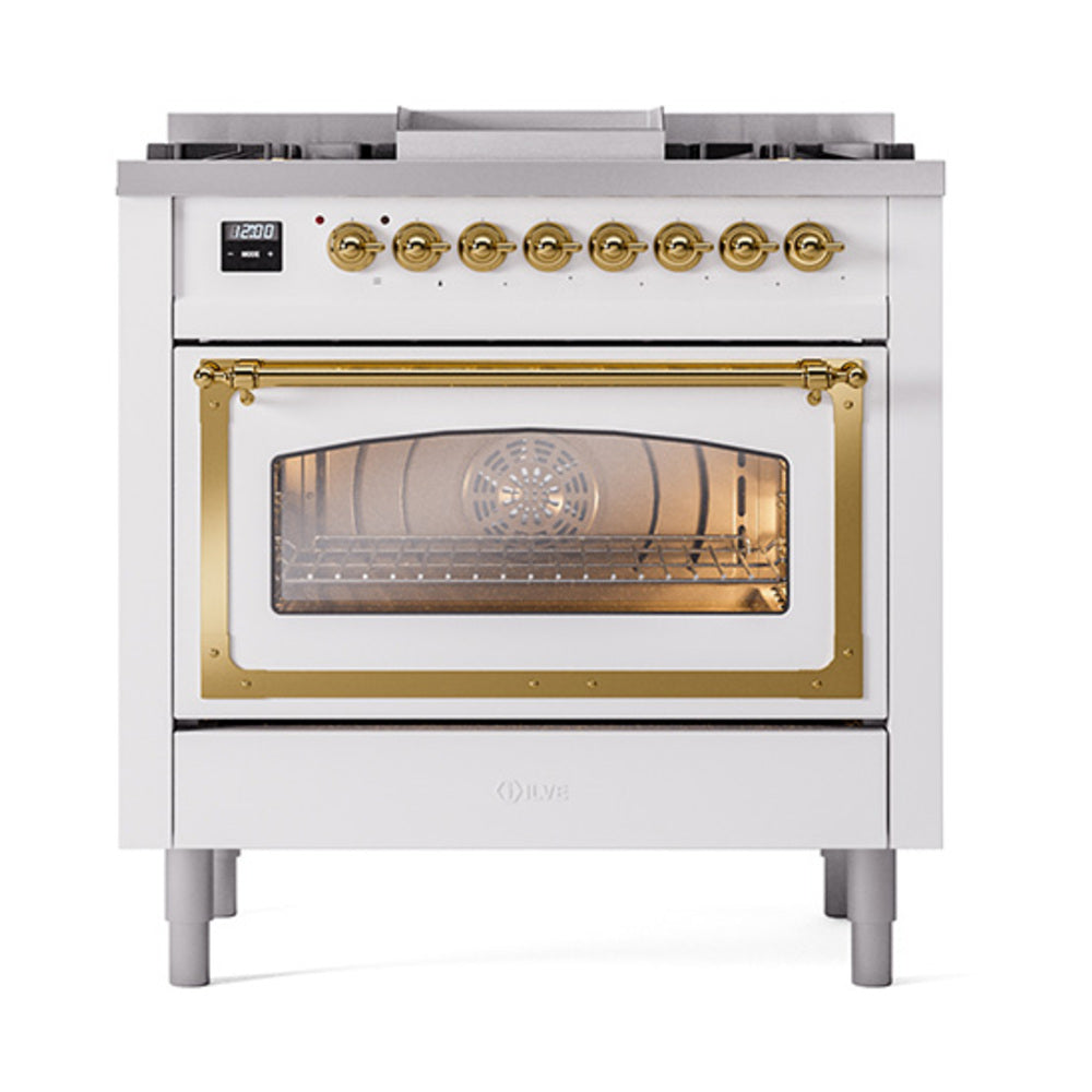 White dual-fuel gas range with brass-trim oven door glass and six black burner grates