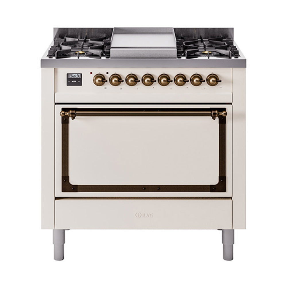 Antique white ILVE dual fuel range with bronze control trim and solid oven door