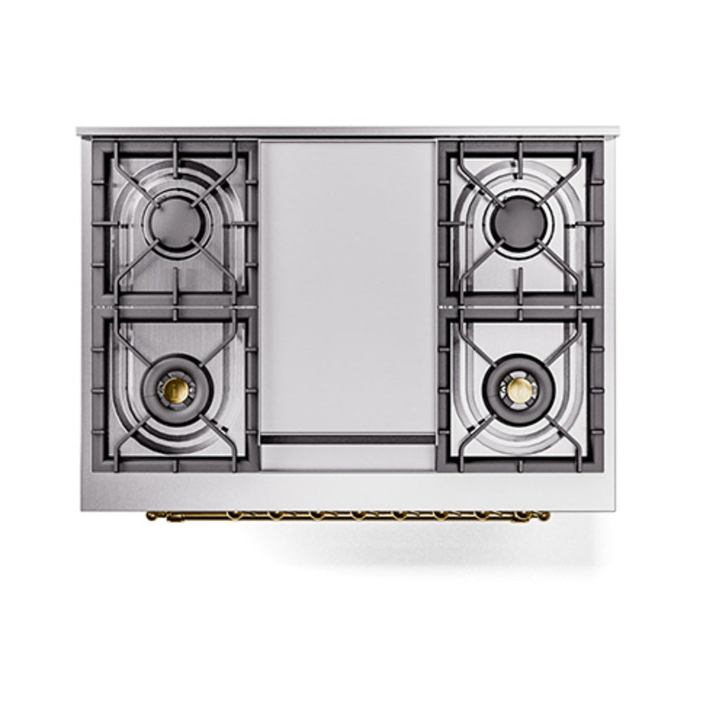 White dual fuel range cooktop with four gas burners and brass-trimmed grates