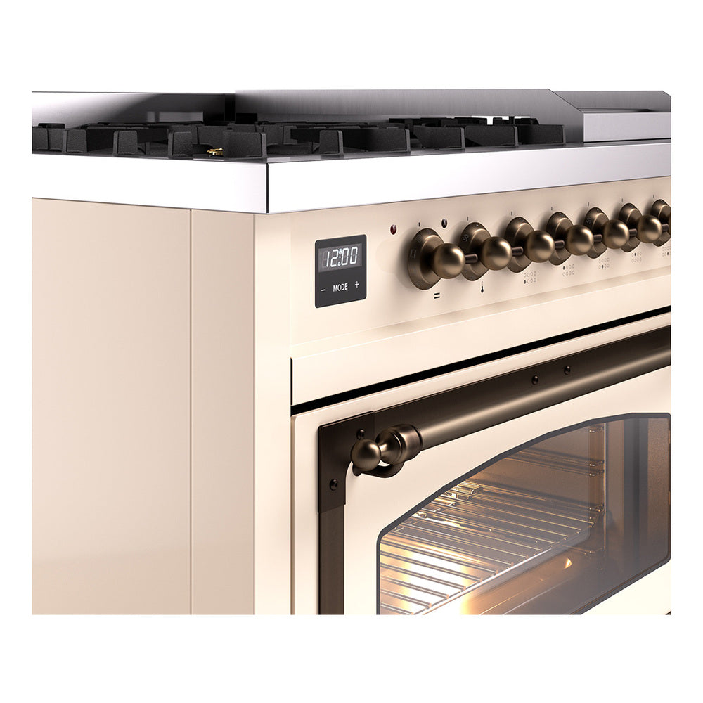 Bronze control knobs and handle on antique white dual fuel freestanding range