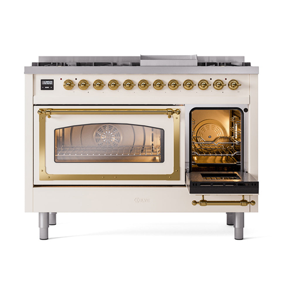 Antique white dual-fuel gas range with brass-trimmed oven door and open main oven