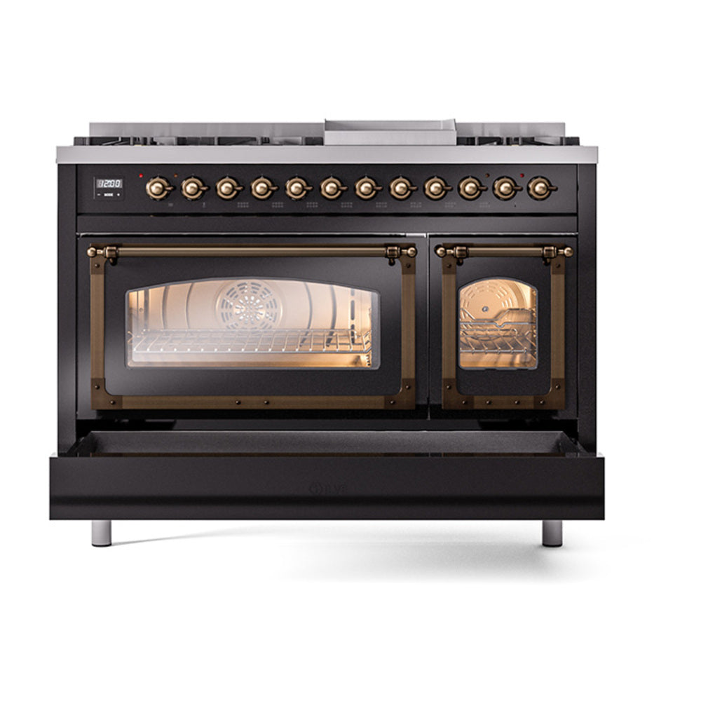 Dual fuel range with lit dual oven windows, bronze knobs, and closed oven doors