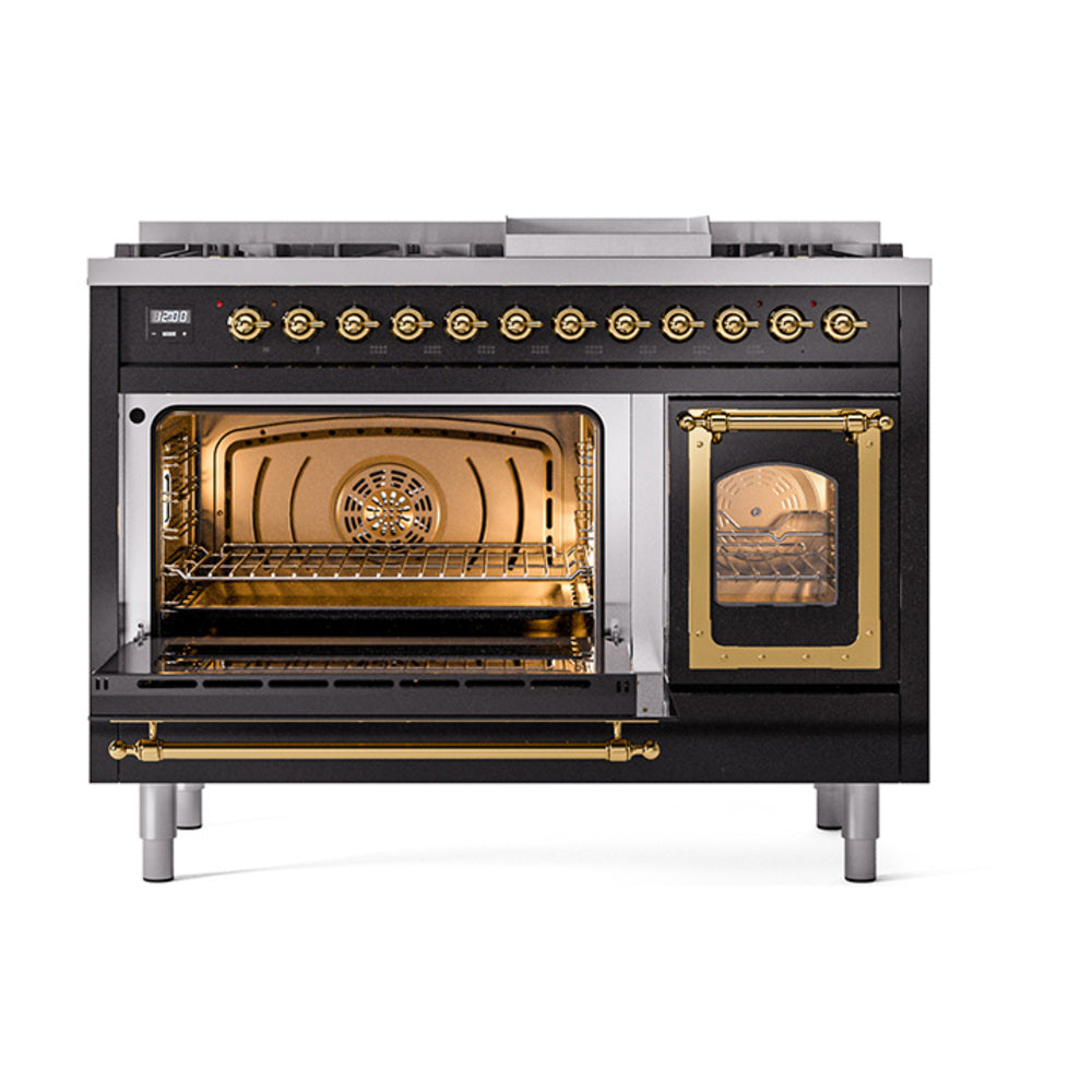 Glossy black freestanding range with brass-trimmed open ovens and wire rack shelves