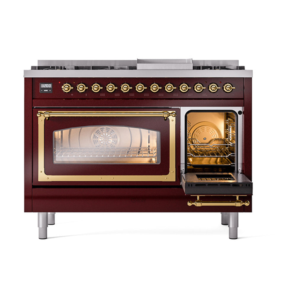 Burgundy dual fuel range with brass trim, left oven door open and right oven closed