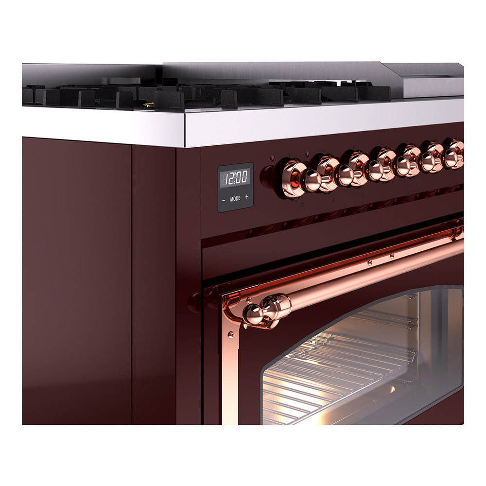 Burgundy dual fuel freestanding range detail view with copper control area and oven handle