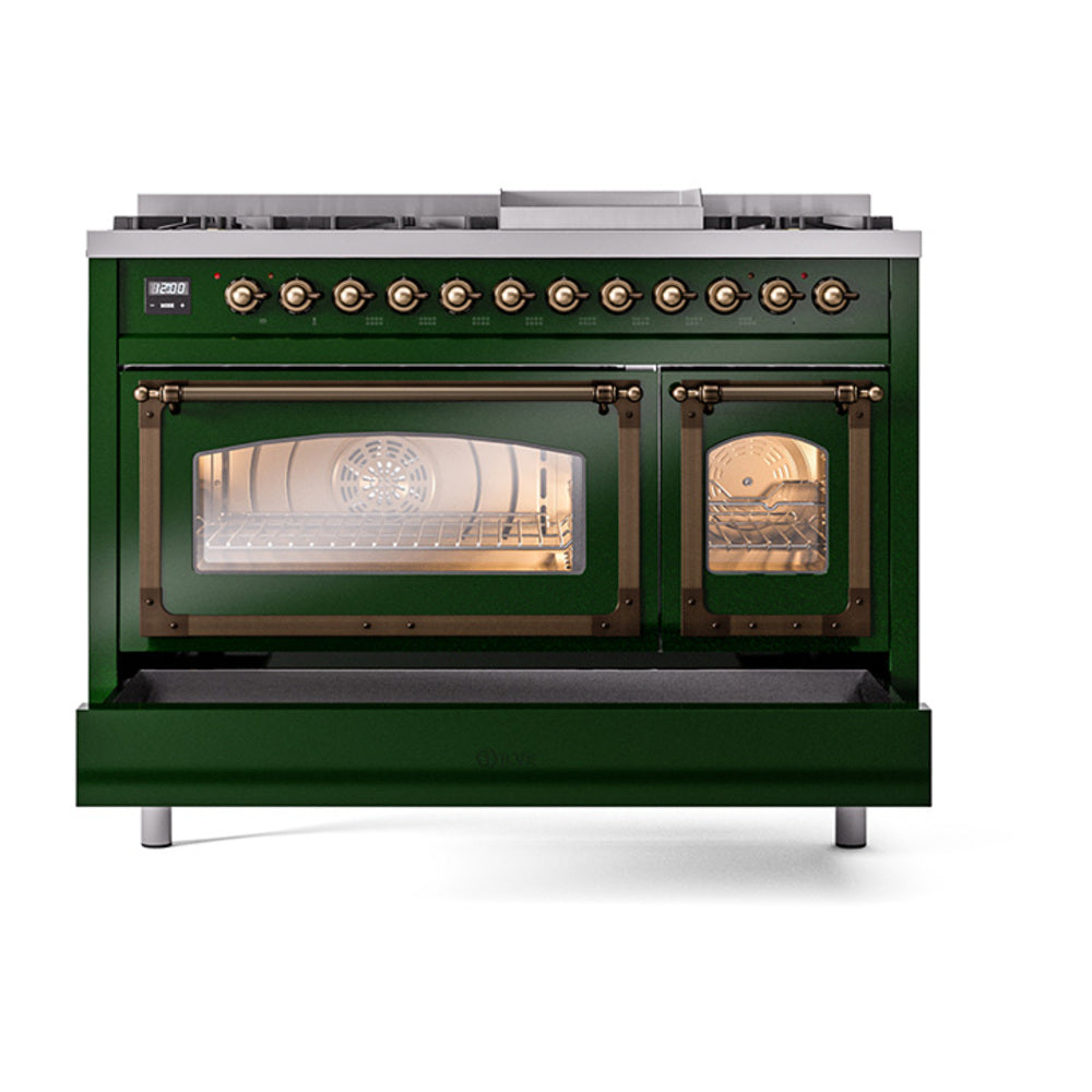 Emerald green dual-fuel range with bronze knobs, left oven lit, right oven closed