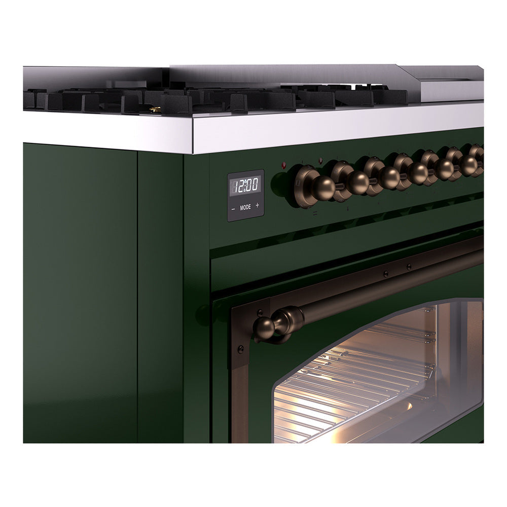Emerald green freestanding range with bronze knob row and open oven door