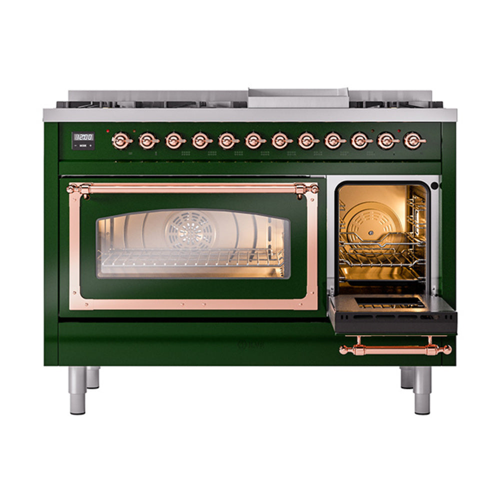 Emerald green dual fuel range front view with lit oven windows and copper-trim door frames.