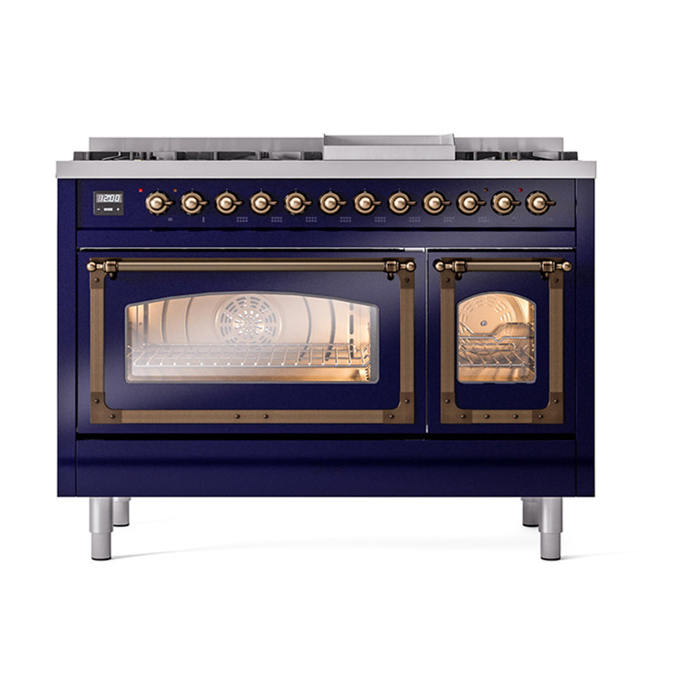 Midnight blue dual fuel range with bronze controls and two open ovens