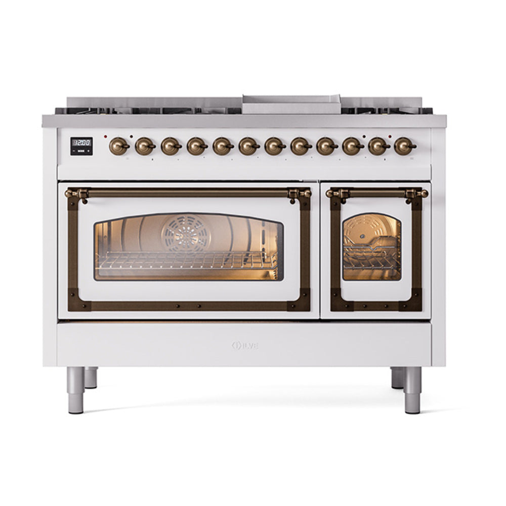 Freestanding dual fuel range in white with bronze control knobs and closed glass doors
