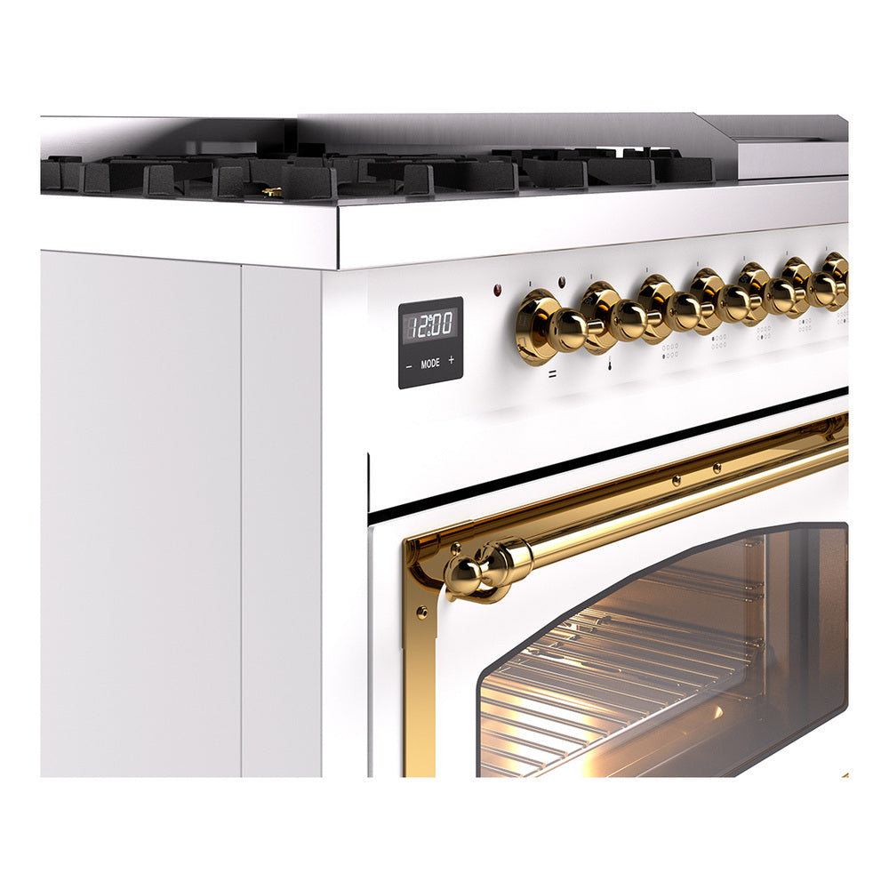 Dual fuel range control panel with gold knobs and brass oven handle