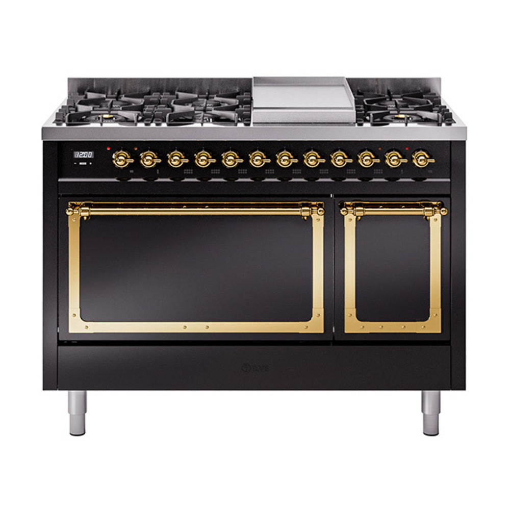 Glossy black freestanding gas range with brass control knobs and front oven doors
