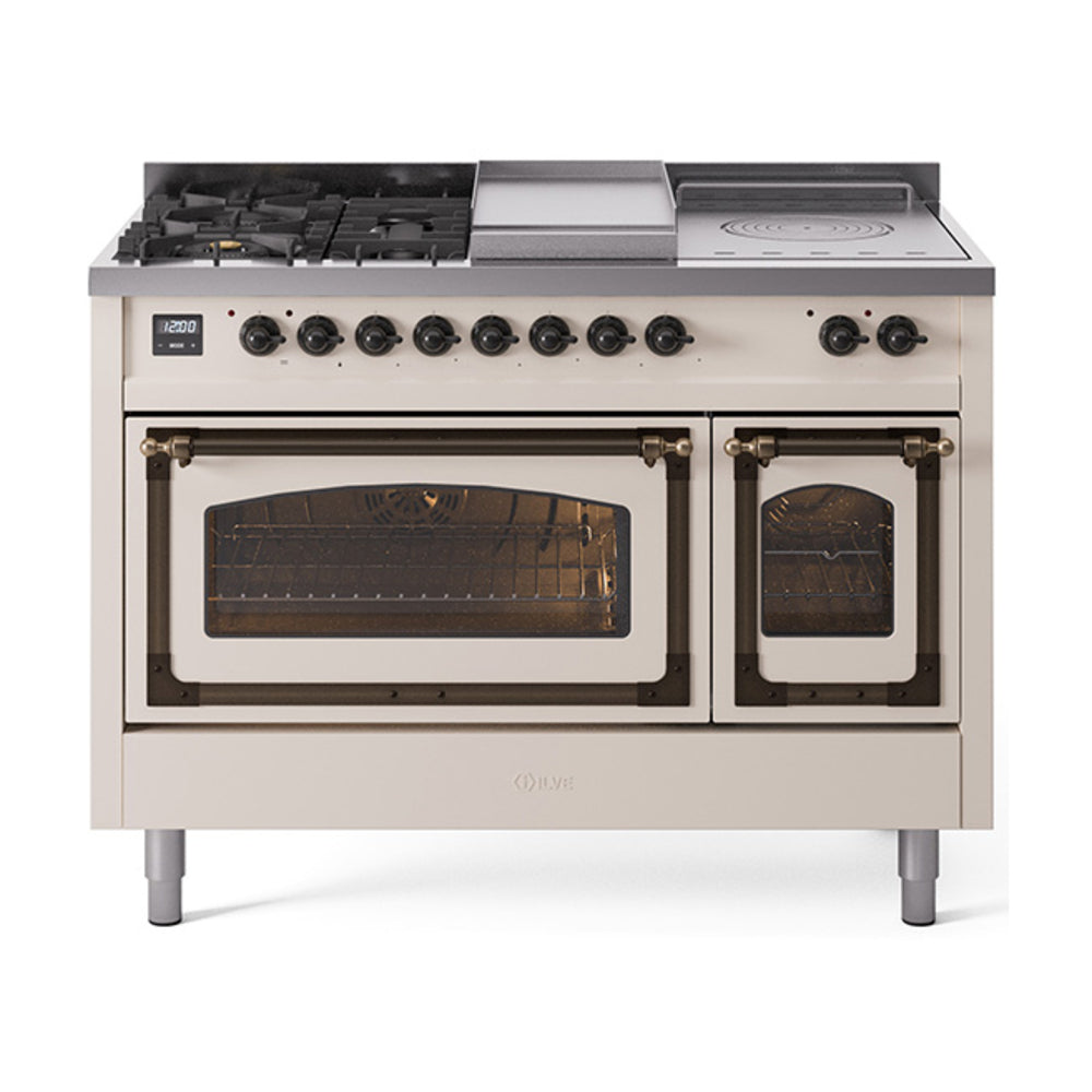 Antique white dual fuel range with bronze-trim knobs, open griddle, and dual glass doors