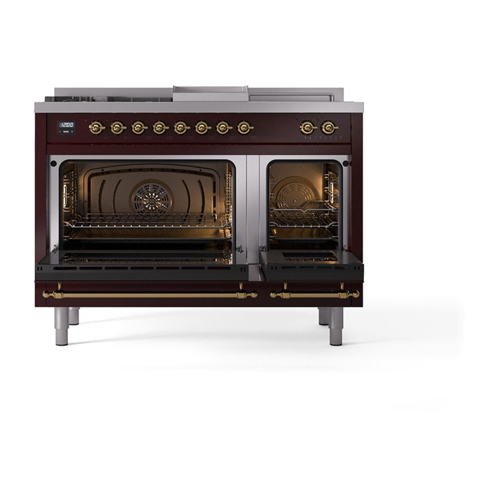 Burgundy dual fuel range with two open oven compartments, brass control knobs and burners