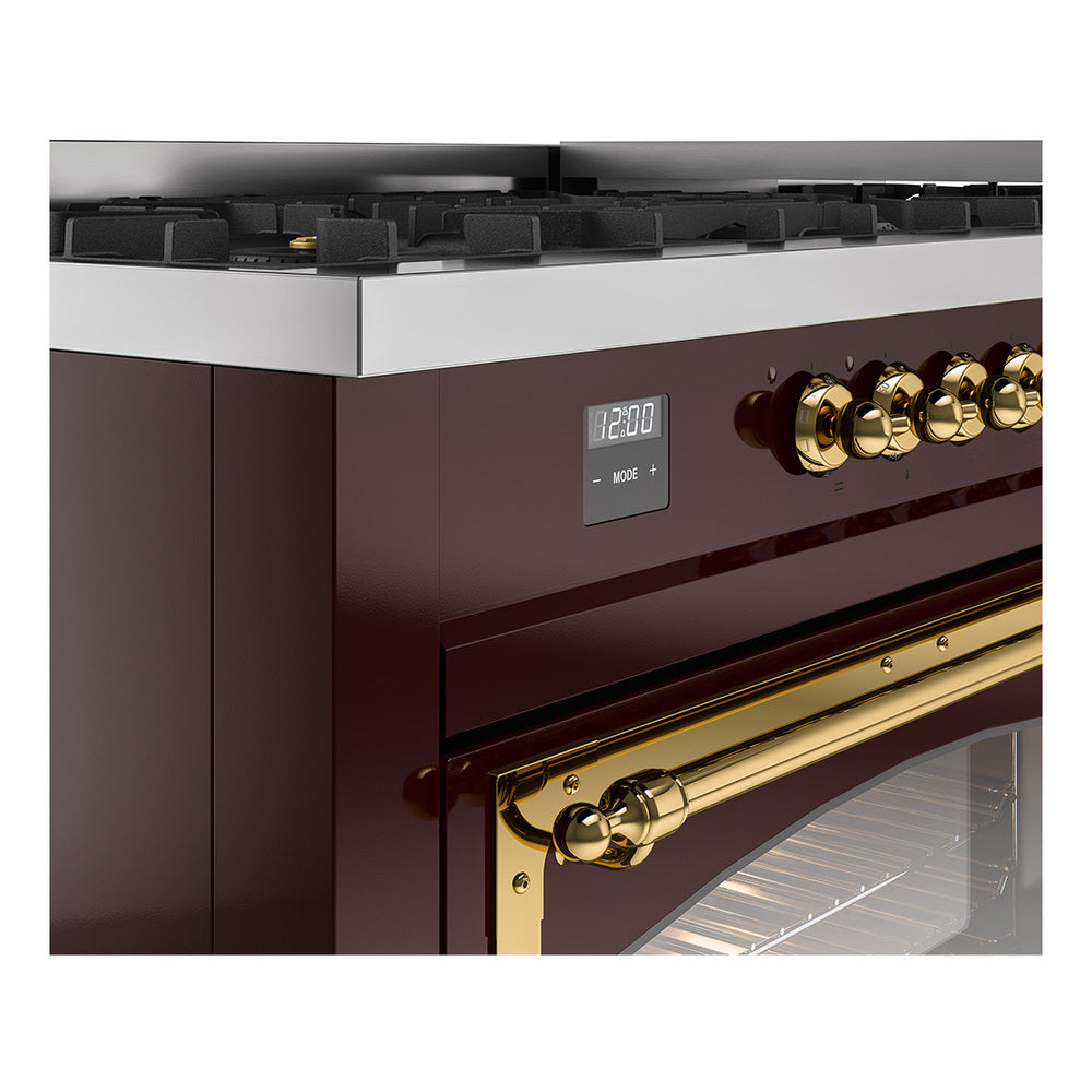 Burgundy dual fuel range side view with brass control knobs and digital display