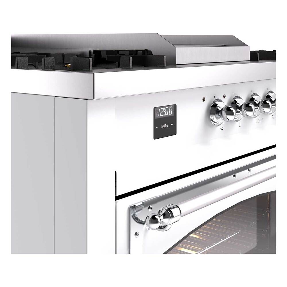 Close-up of white range control panel with chrome knobs and digital display