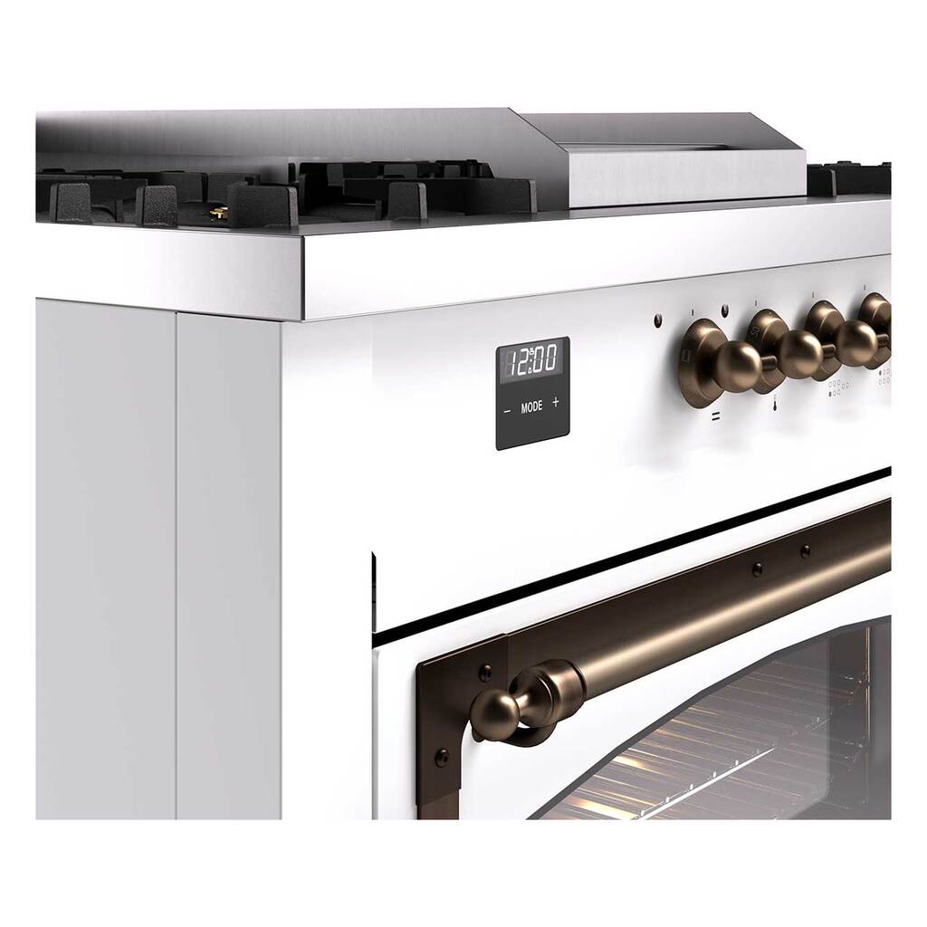 White dual fuel range control panel with bronze knobs and digital clock display