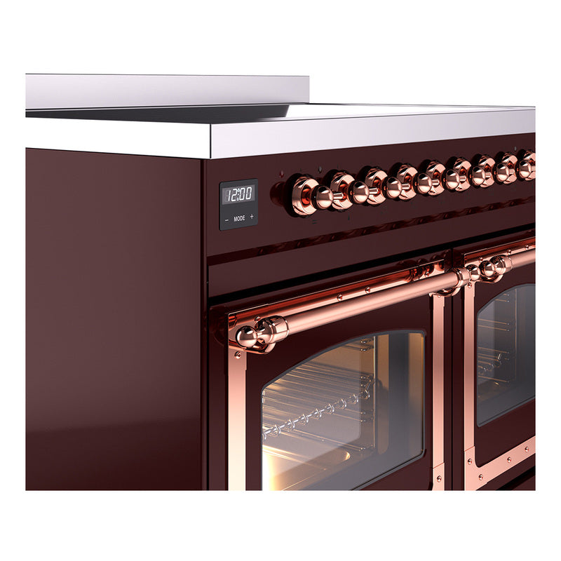 Burgundy induction range with copper knobs and dual oven doors