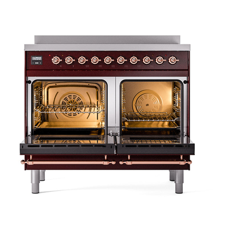 Emerald green induction range with two solid oven doors and copper-trimmed control knobs
