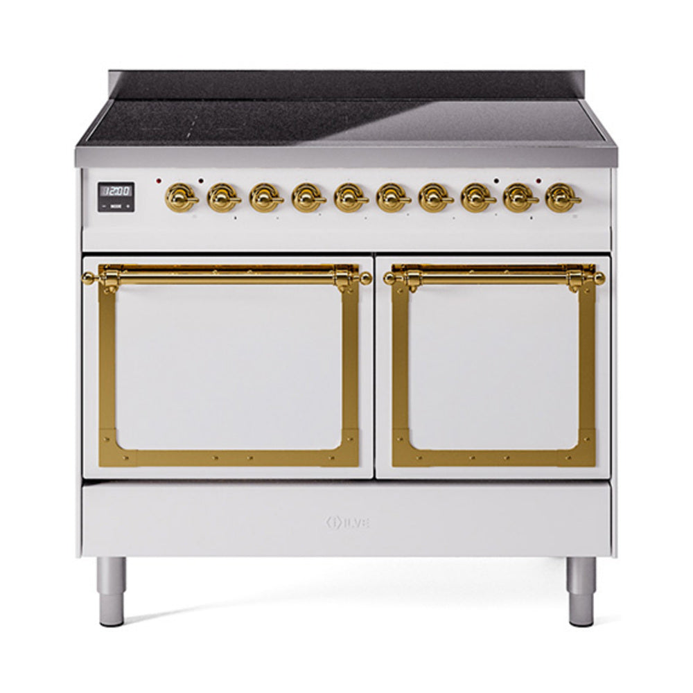 White induction range with brass-trimmed oven doors and front control knobs