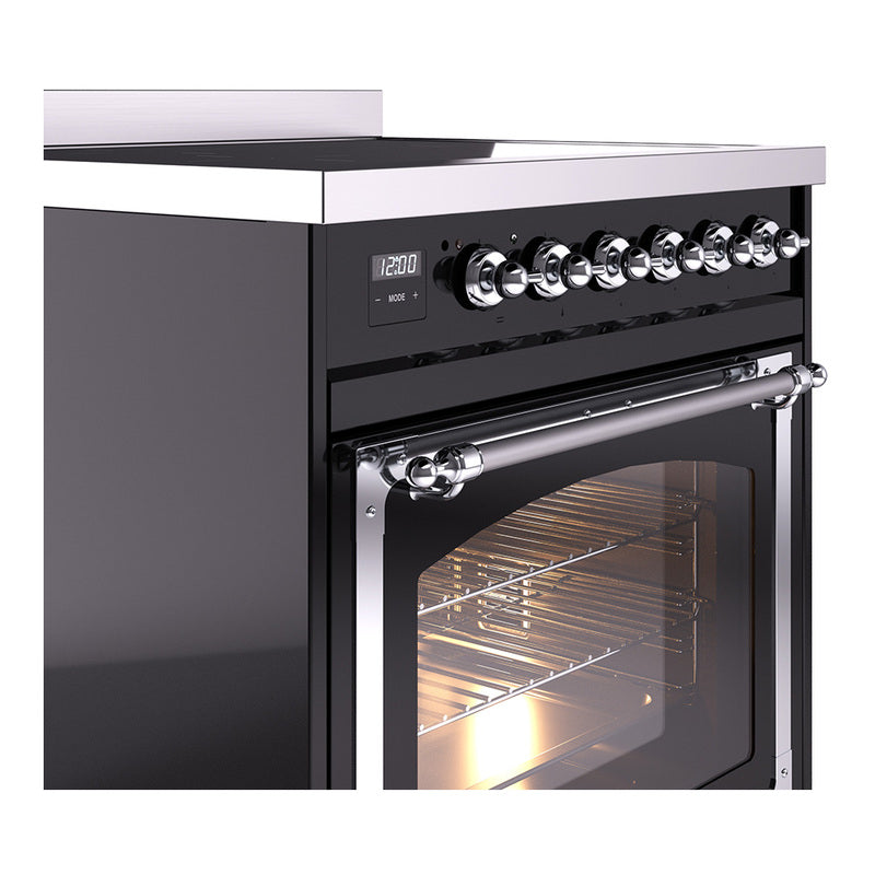 Black induction range with chrome control knobs and open oven door with light