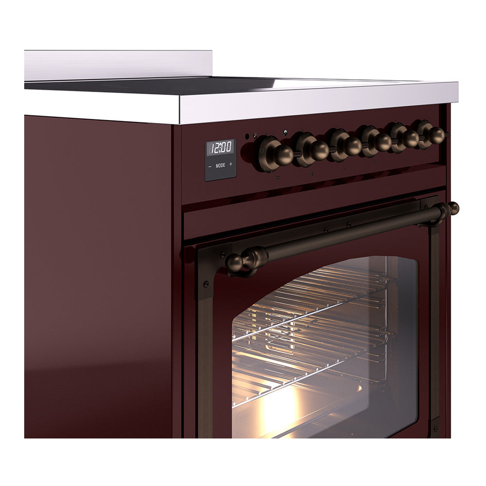 Burgundy induction range cooktop with bronze control knobs and open oven door