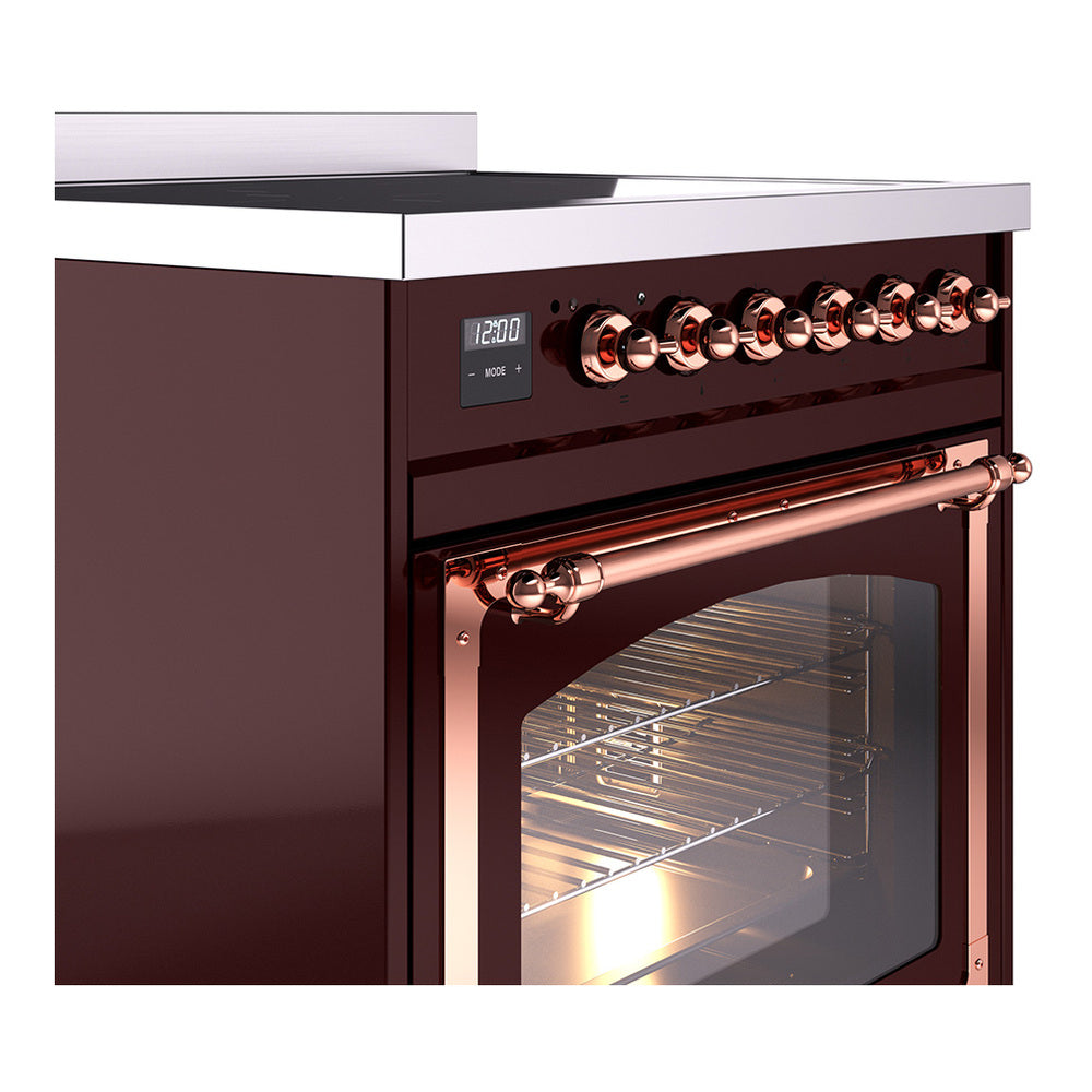 Burgundy induction range corner view with copper knobs and oven door open.