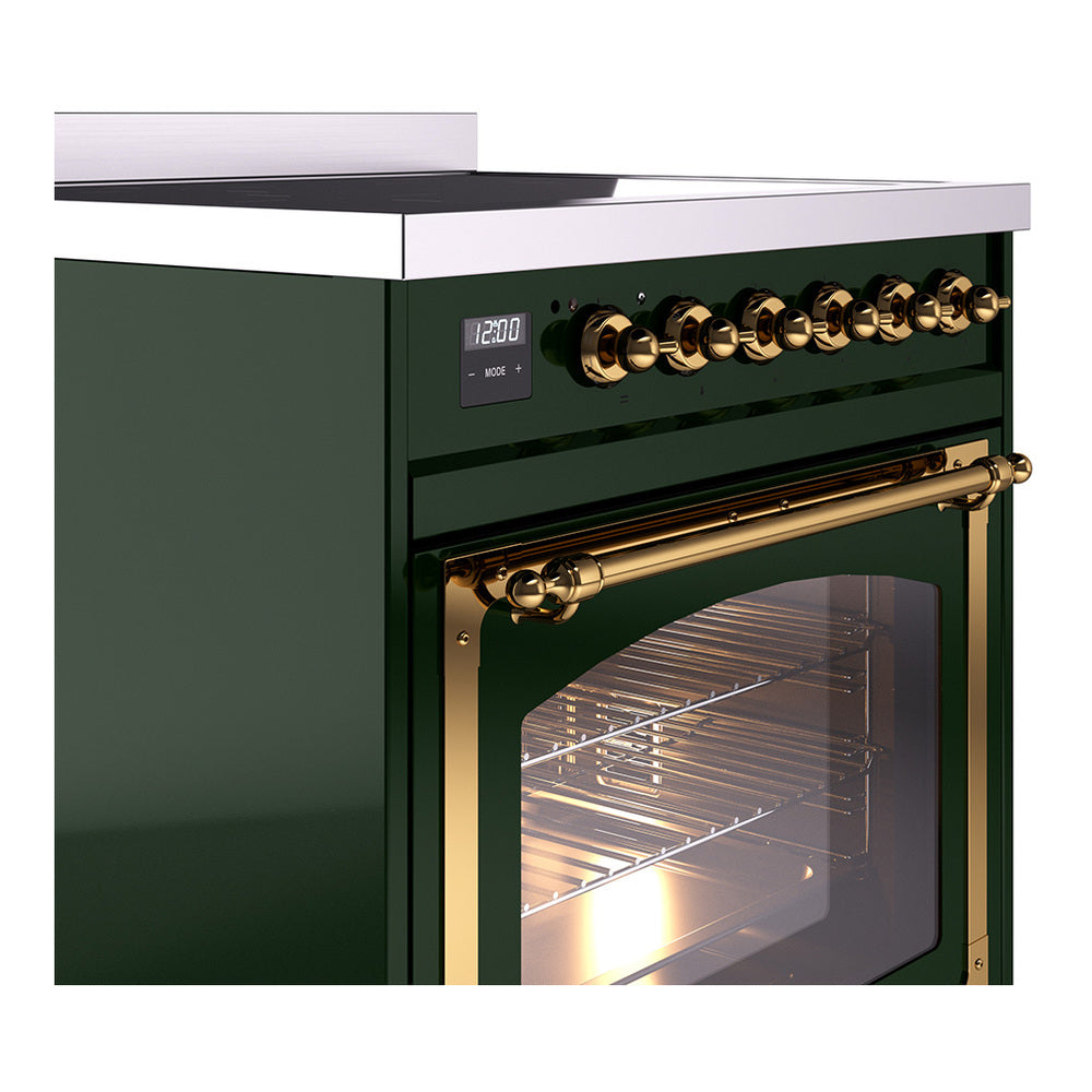 Emerald green range control panel with brass knobs and oven door window