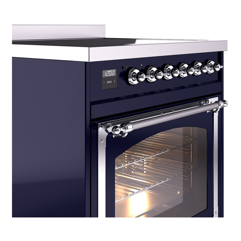 Midnight blue control panel with chrome knobs and lit oven interior through glass