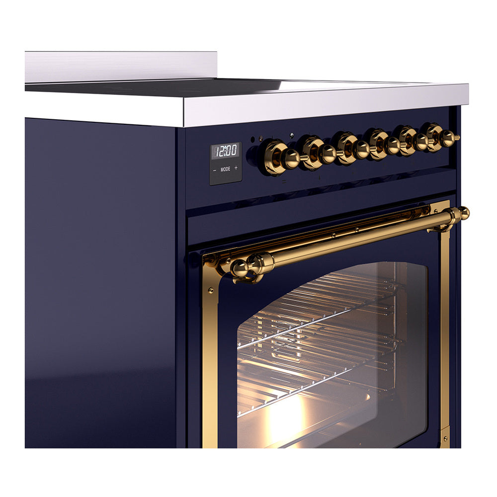 Midnight blue induction range corner view with brass control knobs and oven handle.