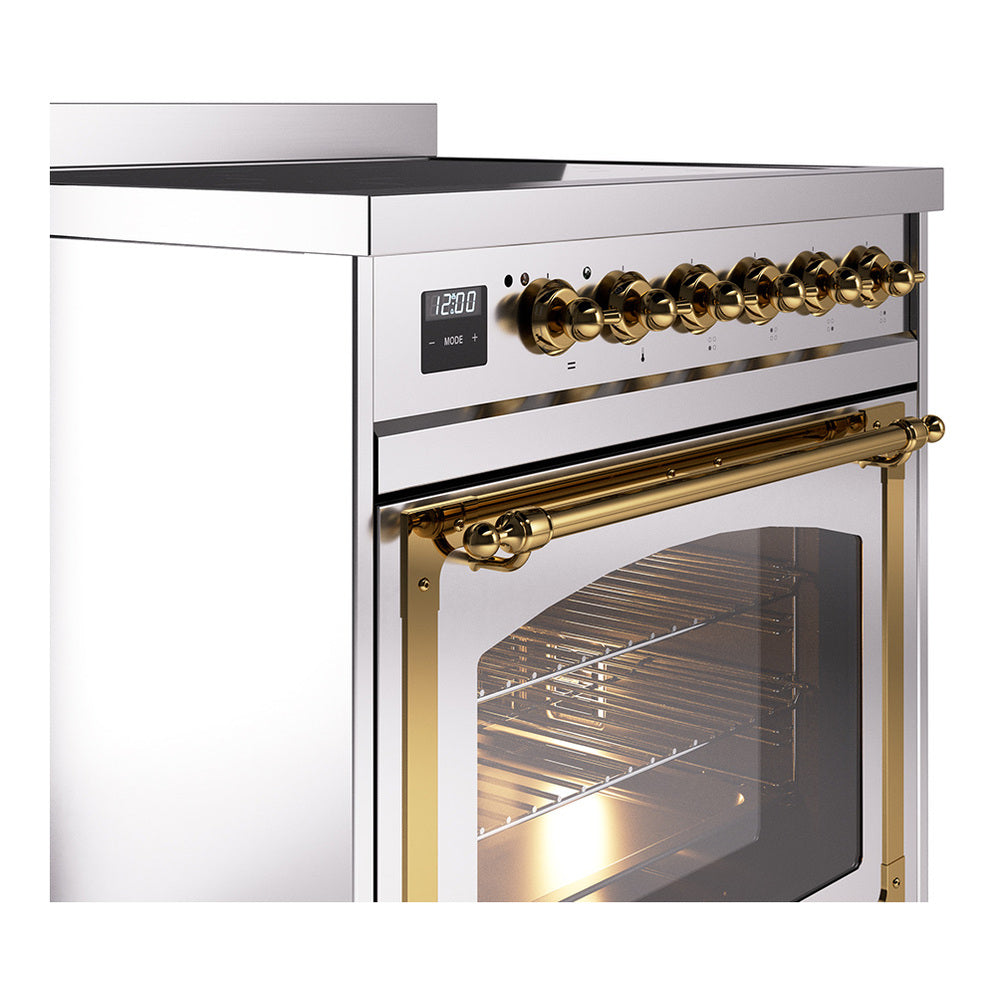 Induction range control panel with brass knob accents and stainless finish, side close-up