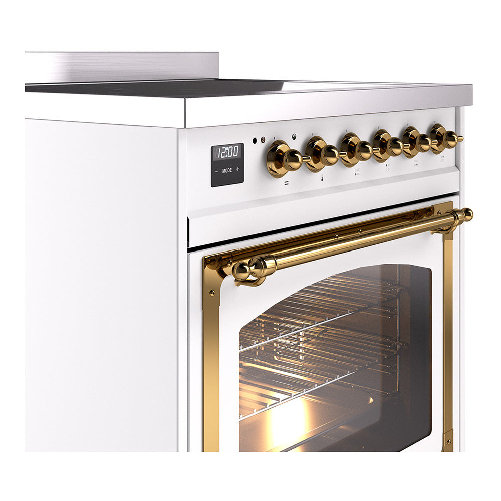 White induction range cooktop with brass control knobs and oven door with glass window.