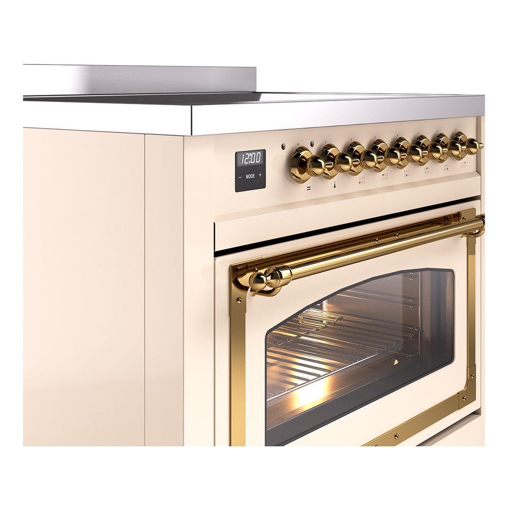 Antique white induction range with brass control knobs and open oven door window
