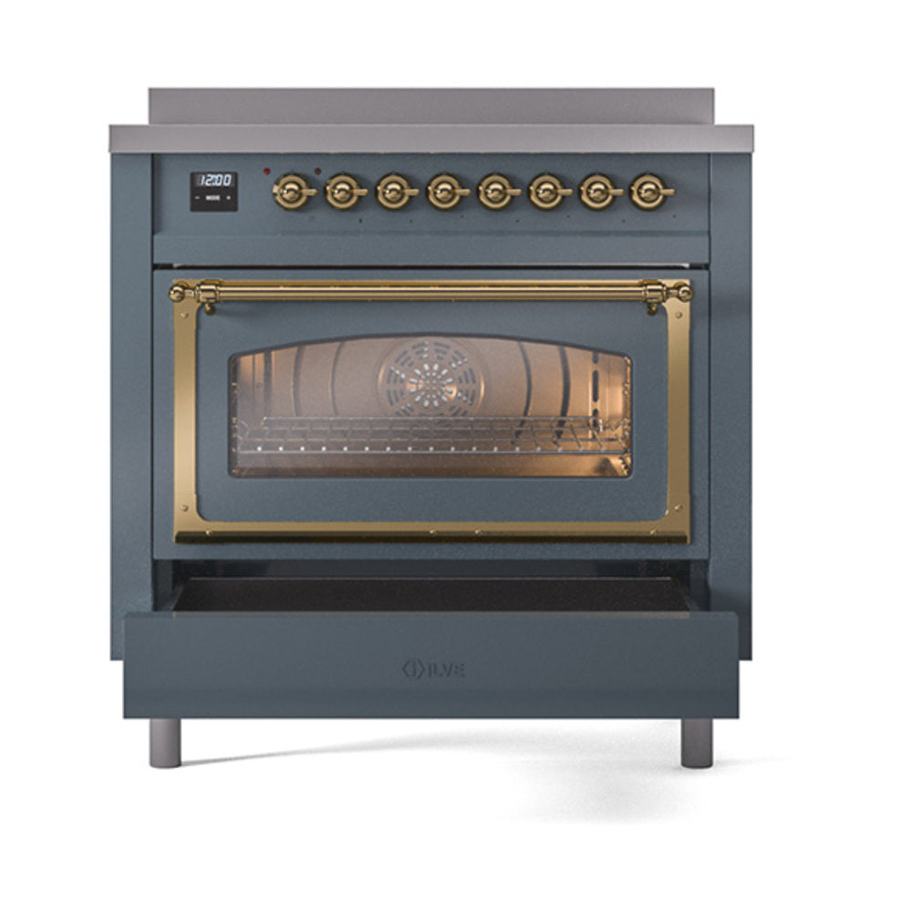 Blue-grey induction range oven door with brass handle trim and illuminated glass