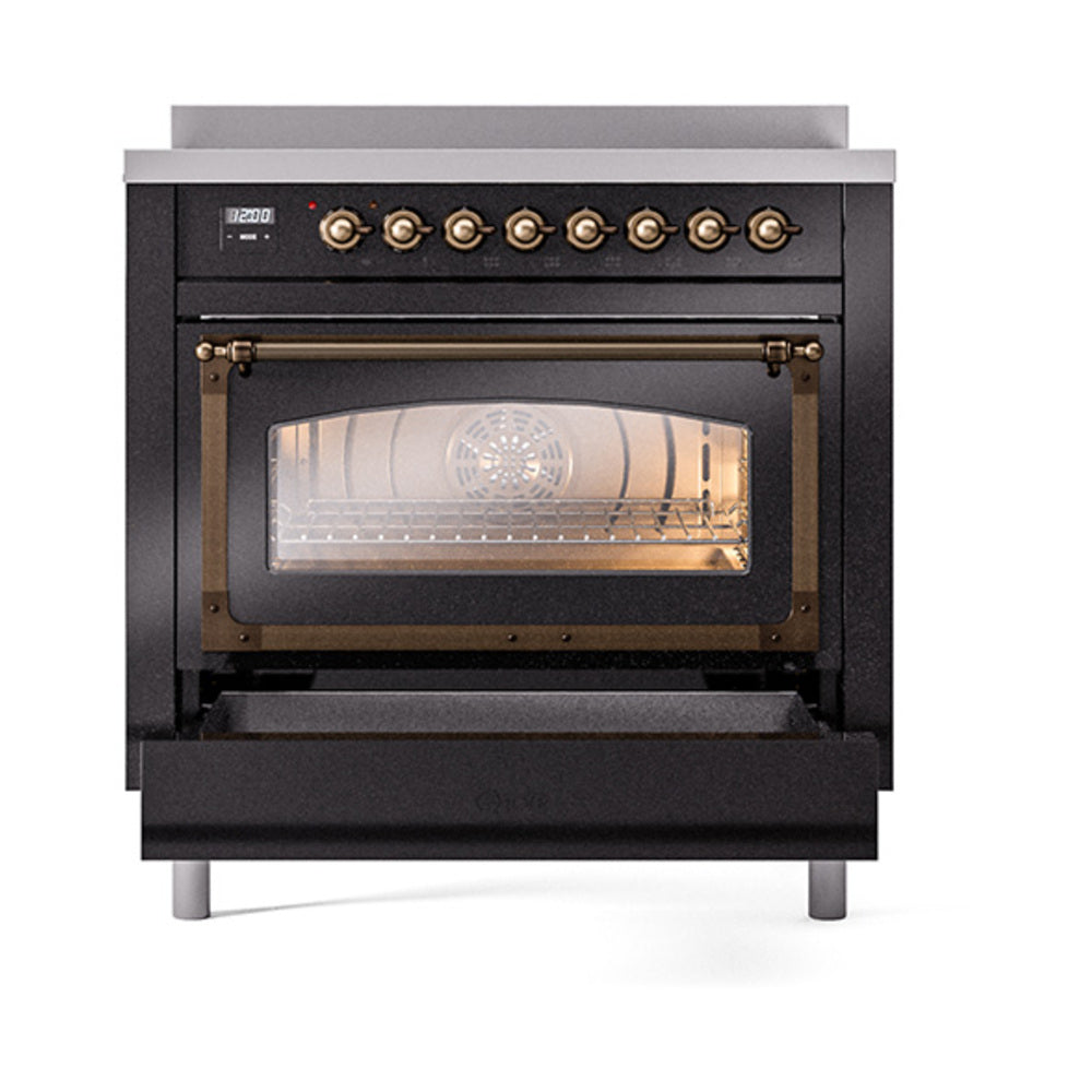 Glossy black induction range with oven door open and bronze-trimmed handle; glass window.