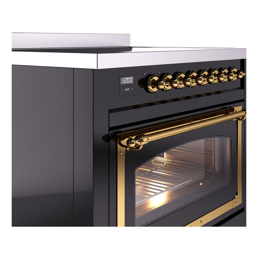 Glossy black ILVE induction range with brass trim and oven door window