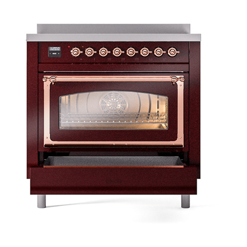 Burgundy oven with open triple glass door, copper handle frame, and control knobs above